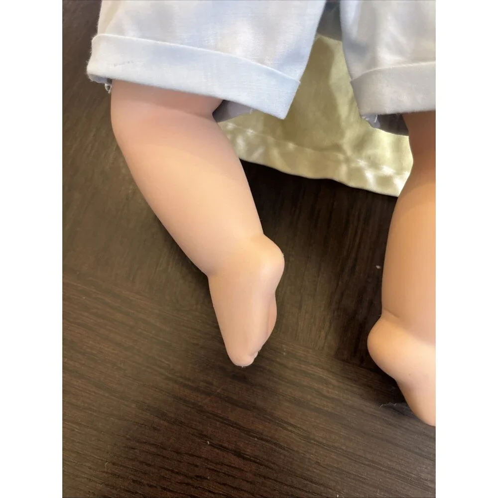 Ashton Drake tickles porcelain
